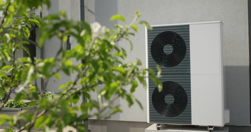 An air source pump on the outside of the building.